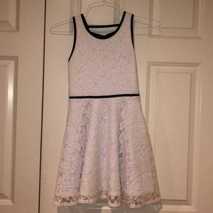 Never worn with tags white and black flowery dress
